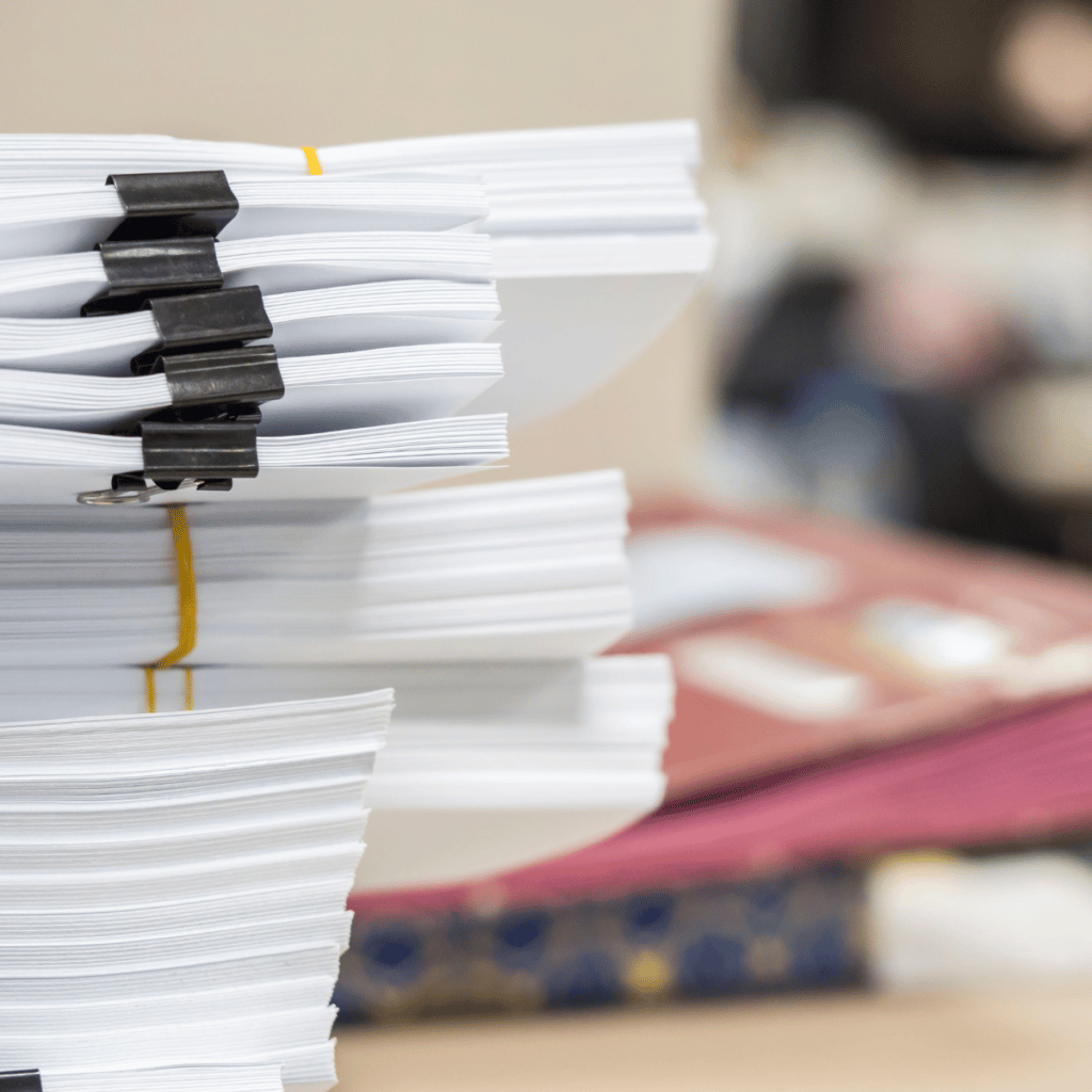 Stack of papers to represent Paper & Packaging Logistics being completed
